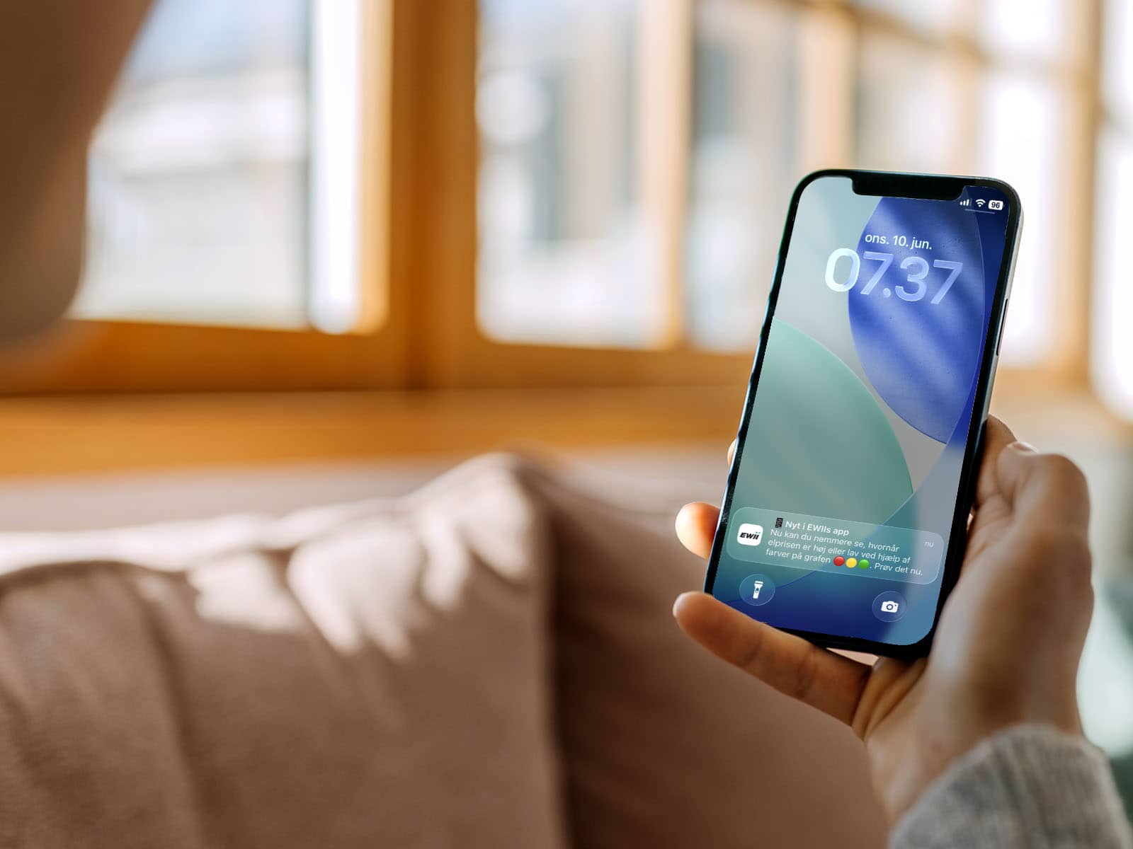 Mobil der viser en push besked fra EWII Energi app