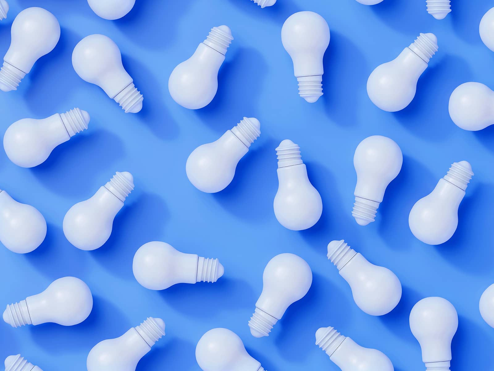 En masse elpærer der ligger på en blå baggrund.